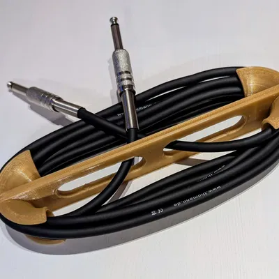 Cuộn quấn dây guitar (Guitar cable winder / reel)