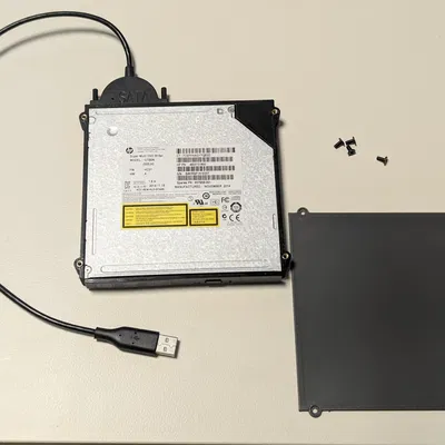 Vỏ mỏng cho HP Slim DVD Burner