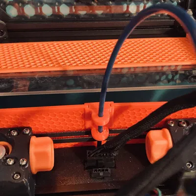 Giá đỡ ống PTFE filament cho Voron 0.2 (PTFE filament tube mount)