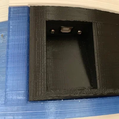 Cổng USB giấu trong coin return cho thân Mr. Baddeley Mark III