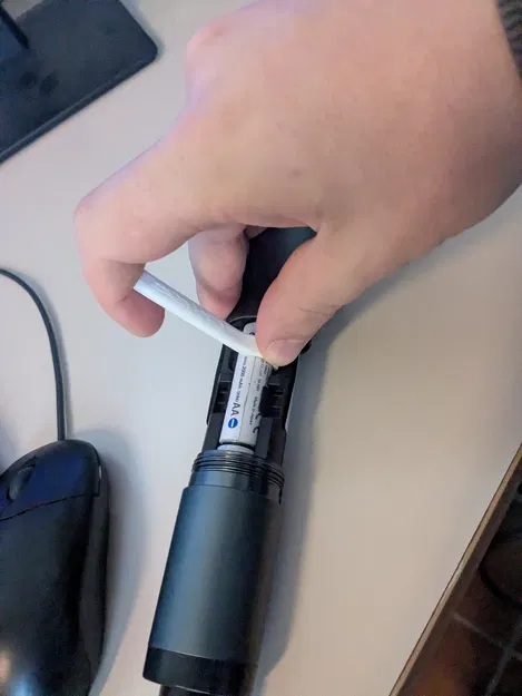 Dụng cụ gỡ pin AA (AA Battery Remover) - Image 2