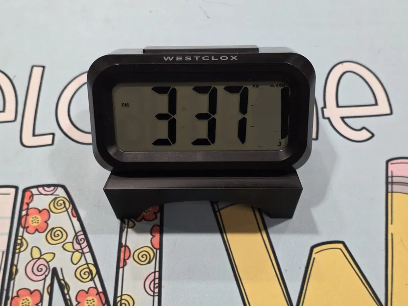 Chân Đế Đồng Hồ Báo Thức Nghiêng - Image 1