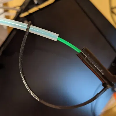 Nắp ống PTFE kèm chặn filament và dây giữ (retaining strap)