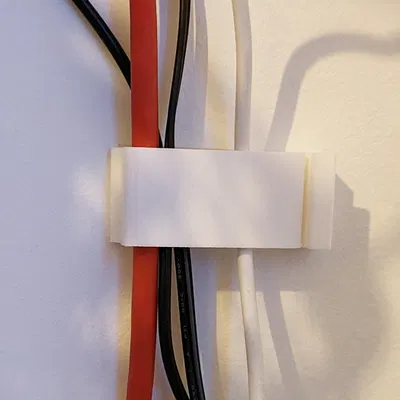 Kẹp dây cáp print-in-place dùng băng keo dán hai mặt