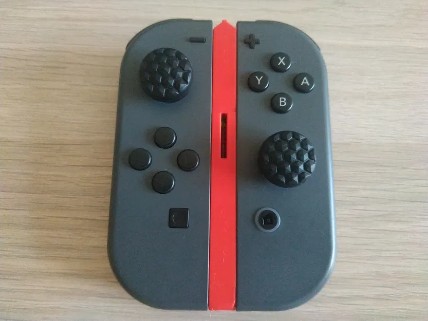 Tay cầm mini Joy-Con cho Nintendo Switch (minigrip) - Image 1