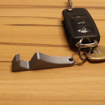 Móc khóa kiêm giá đỡ điện thoại (Keychain smartphone holder)