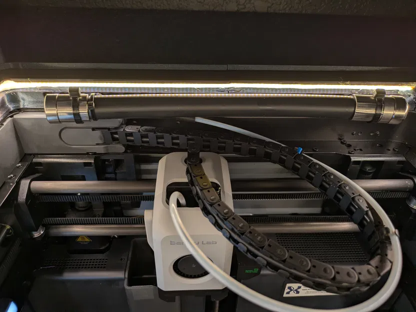 Điểm gắn zip tie (hoặc nút vent) cho DK Riser – Blazecut Mount cho X1C - Image 1