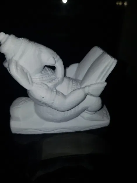 Ganesha Reading (Ganesha ngồi đọc sách trên đá) - Image 1