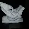 Ganesha Reading (Ganesha ngồi đọc sách trên đá) - Thumbnail 1