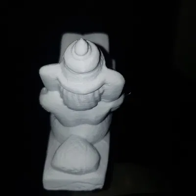 Ganesha Reading (Ganesha ngồi đọc sách trên đá)