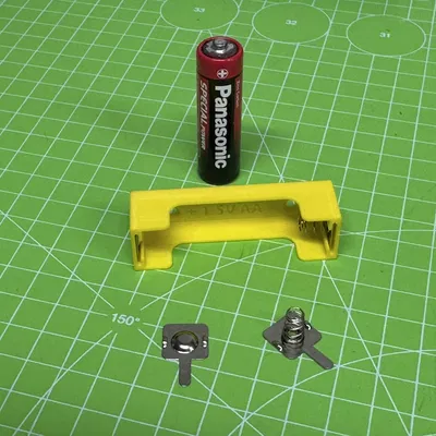 Khay giữ pin AA có lỗ bắt vít