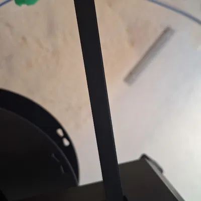 Bộ dẫn filament gắn trên tay đỡ cuộn (spool arm)