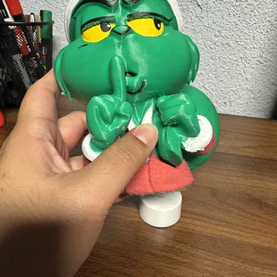 Tượng bán thân Grinch mặc đồ Santa Claus có đèn