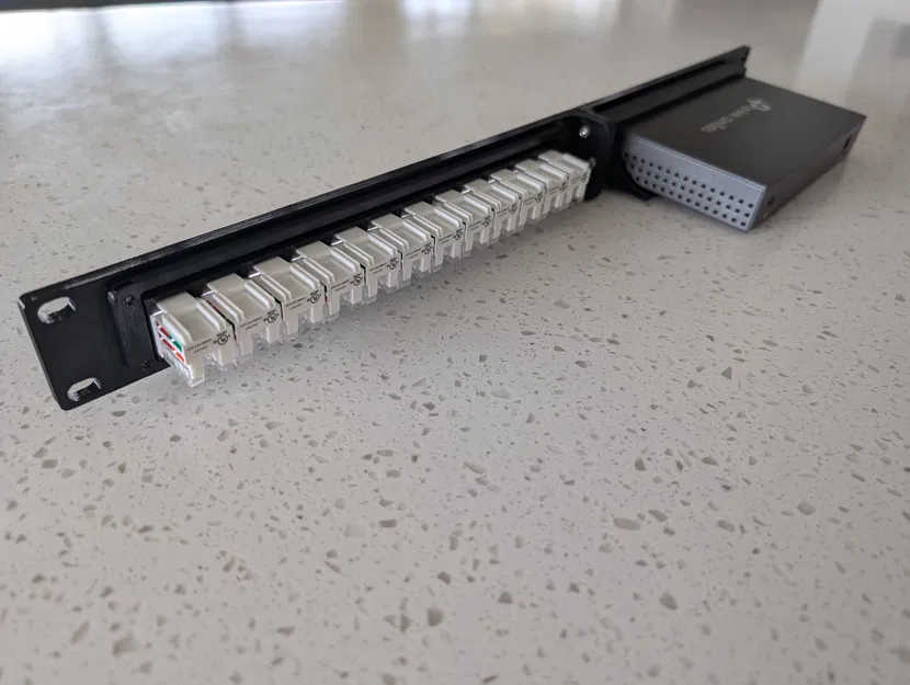 Giá đỡ rack 19" cho TP-Link ER605 + panel keystone 12 cổng - Image 2