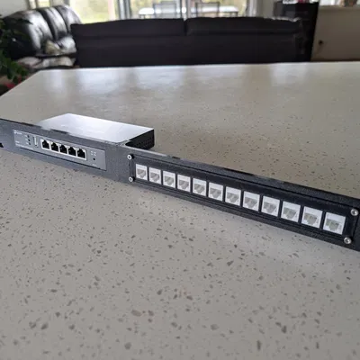 Giá đỡ rack 19" cho TP-Link ER605 + panel keystone 12 cổng