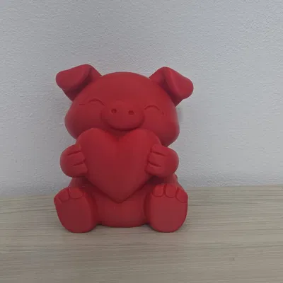 Tượng Heo Con Đỏ Dễ Thương Cầm Trái Tim