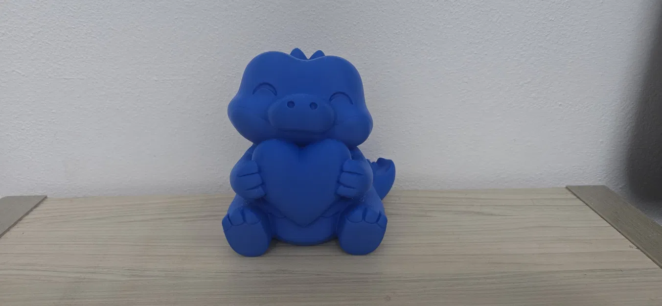 Mô Hình Cá Sấu Xanh Dễ Thương Ôm Trái Tim - Image 1