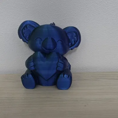 Tượng Koala Xanh Dễ Thương Ôm Trái Tim