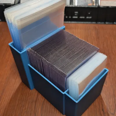 Giá đựng dụng cụ đóng gói gửi bài TCG (TCG Card Shipping Supply Holder)