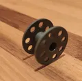 Ống suốt/ống chỉ máy may (sewing machine bobbin spool) - Thumbnail 1