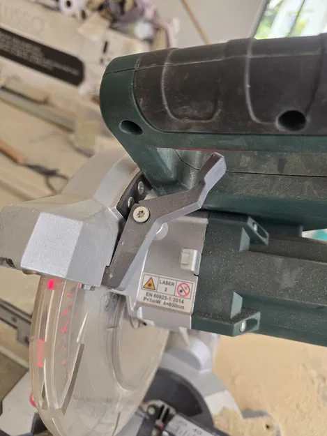 Cần nhả chốt chắn lưỡi Metabo Mitre Saw (KGS 216/M) - Image 1