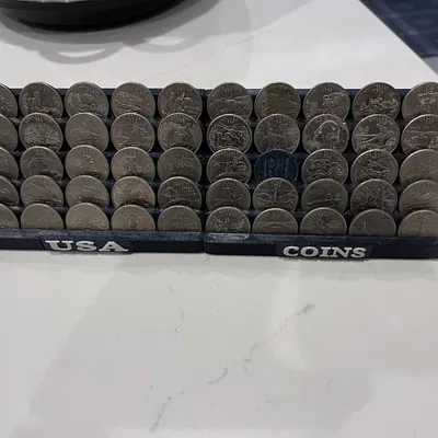 Kệ trưng bày bộ sưu tập Quarter (Quarter Collection Display)