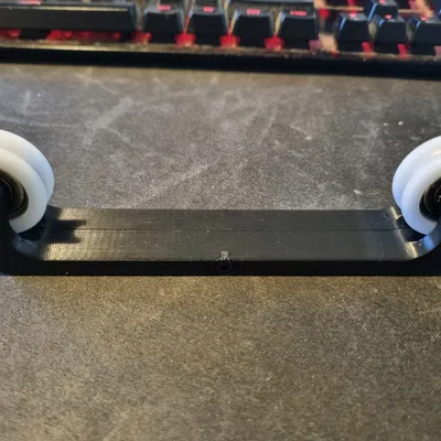 Giá đỡ cuộn filament (Filament spool holder)