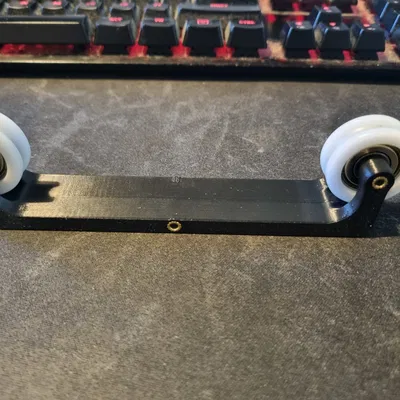 Giá đỡ cuộn filament (Filament spool holder)