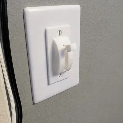 Tay gạt công tắc đèn (Light switch lever)