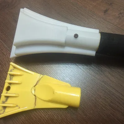 Cây cạo xe hơi (скребок автомобильный)