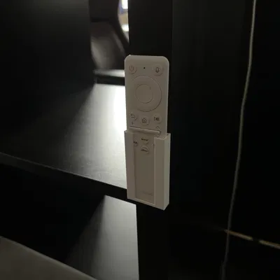 Giá treo tường giữ remote Samsung Freestyle