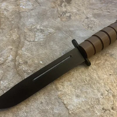 Dao đồ chơi KA-BAR kiêm dụng cụ bóp kem đánh răng (toothpaste squeezer/squeegee)