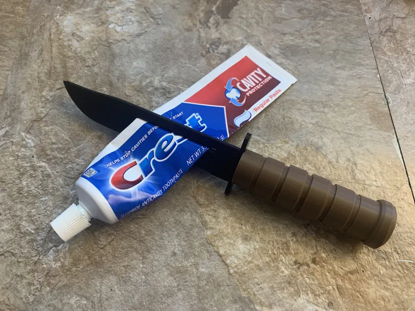 Dao đồ chơi KA-BAR kiêm dụng cụ bóp kem đánh răng (toothpaste squeezer/squeegee) - Image 4