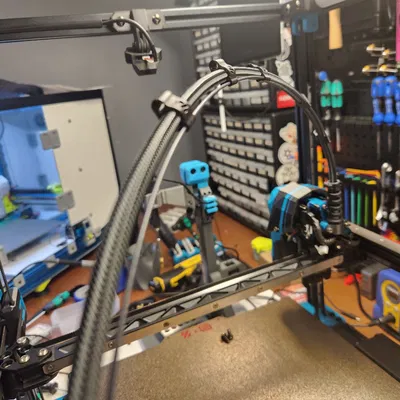 Kẹp Umbilical có PTFE Guide & Filament Support logo Voron