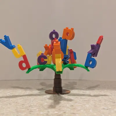 Alphabet Tree Topple – Trò Chơi Cân Bằng Chữ Cái