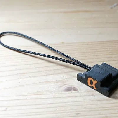 Nắp hot shoe Sony kèm dây giữ an toàn