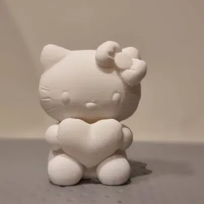 Tượng mô hình Hello Kitty cầm trái tim