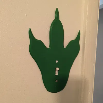 Ốp Che Công Tắc Đèn Hình Bàn Chân Khủng Long