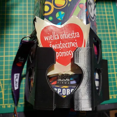 Uchwyt na puszkę WOŚP – Giá/holder treo lon có túi đựng tim