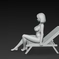 Cô gái mặc đồ bơi ngồi trên ghế xếp (deck chair) 2 - Thumbnail 2