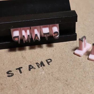 Giá đỡ chữ cho con dấu (Stamp letter holder)