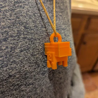 Mặt dây chuyền Heo Minecraft Dungeons đeo rương (Piggy Bank)