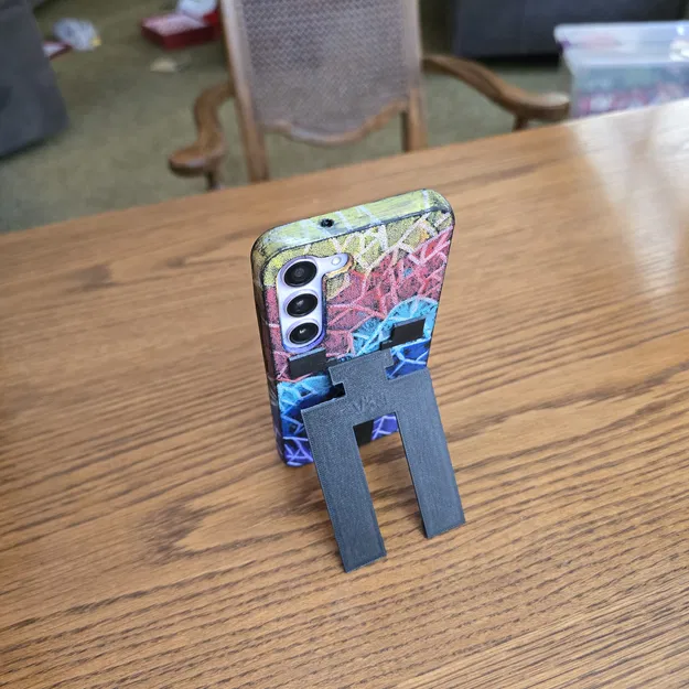 Chân đỡ điện thoại bật ra (Pop-out cellphone stand) - Image 1