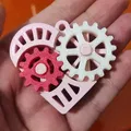 Móc khóa đồ chơi fidget hình trái tim bánh răng - Thumbnail 1