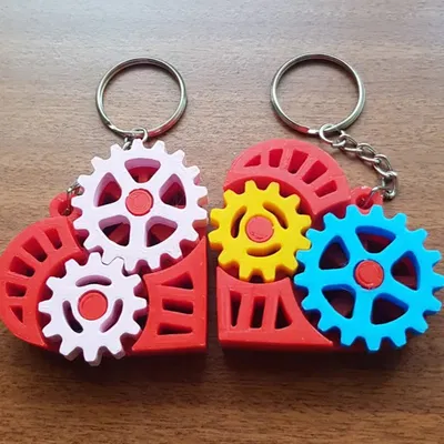 Móc khóa đồ chơi fidget hình trái tim bánh răng