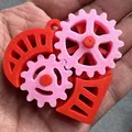 Móc khóa đồ chơi fidget hình trái tim bánh răng - Thumbnail 5