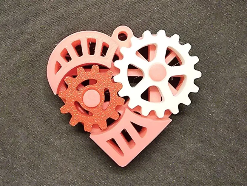 Móc khóa đồ chơi fidget hình trái tim bánh răng - Image 6