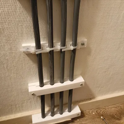 Giá kẹp dây điện gắn tường (electric power kabel holder wall)