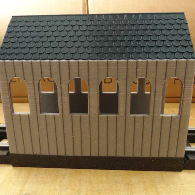 Nhà kho cho tàu chạy xuyên qua cho đường ray Lincoln Log