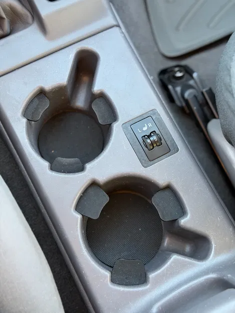 Giá gắn công tắc ghế sưởi vào khay coin tray cho Tacoma 1st Gen - Image 1